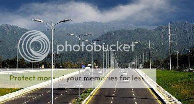 A-road-in-Islamabad-Margalla-Hills-at-the-back_zps8fb68911.jpg