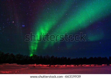 stock-photo-northern-lights-aurora-borealis-display-near-kaamanen-finland-66319939.jpg