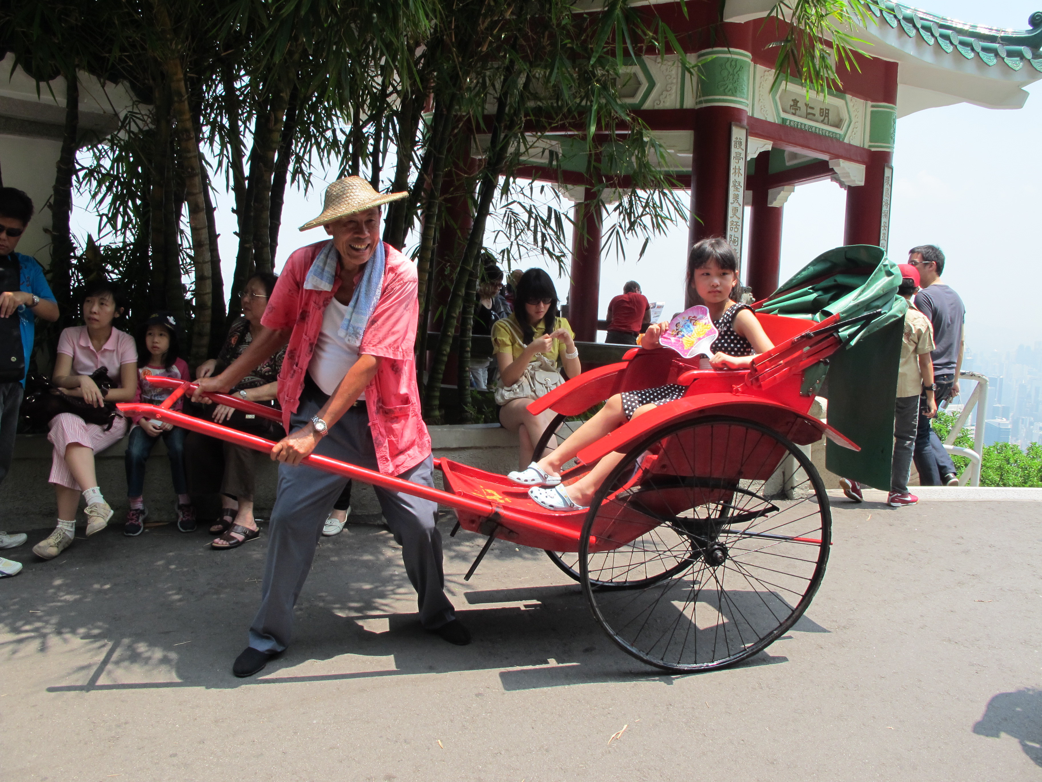 The_final_rickshaw_ride_in_Hong_Kong.jpg