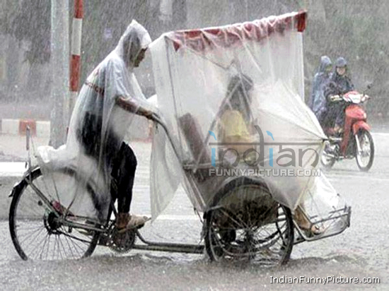 Funny_Bike_Taxi_In_Rain.jpg
