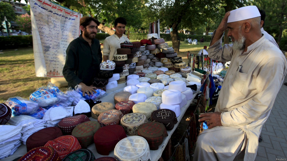 150618080853_prayer_cap_stall_islamabad_976x549_reuters.jpg