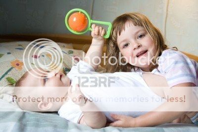 3415755-little-brother-and-sister-playing-together-on-white_zps3507cdde.jpg
