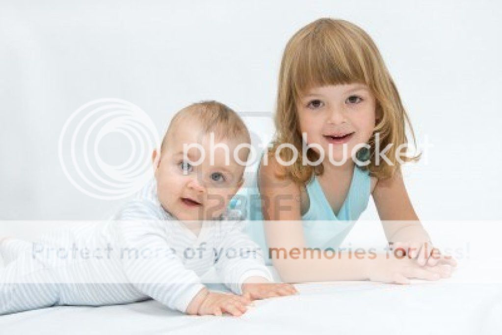 3427298-little-brother-and-sister-playing-together-on-white_zpse29ebd43.jpg