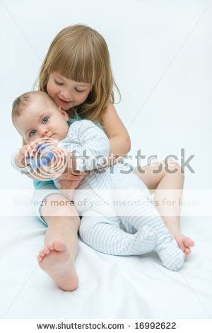 stock-photo-little-brother-and-sister-playing-together-on-white-16992622_zps148995c2.jpg