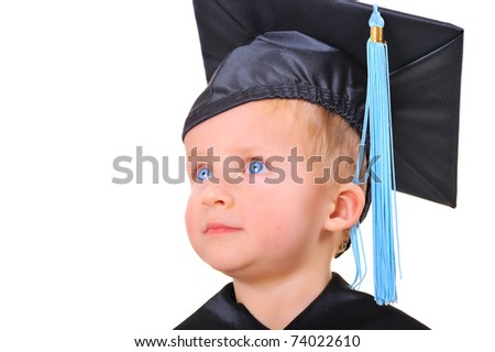 stock-photo-cute-little-boy-in-graduation-gown-thinking-74022610.jpg