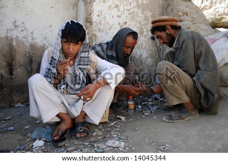 stock-photo-afghan-opium-smokers-14045344.jpg