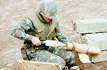220px-White_Phosphorous_mortar_round.jpg