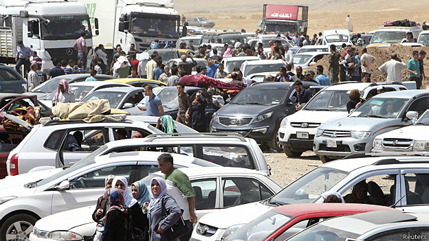 140610185836_sp_mosul_gente_huye_autos_624x351_reuters.jpg