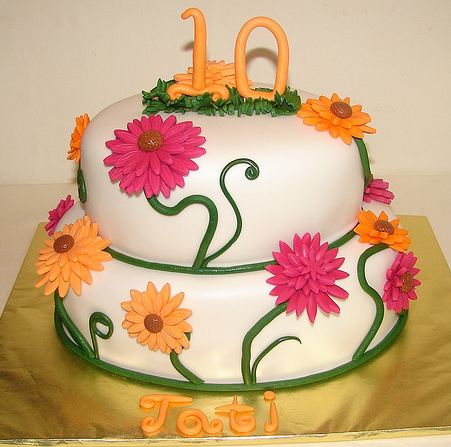 Two+tier+10th+birthday+cake+in+white+with+summer+flower+decor.JPG
