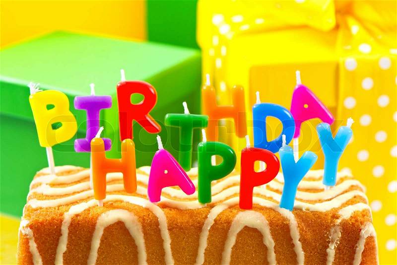 3367164-263856-birthday-cake-with-letter-candles-and-gifts.jpg