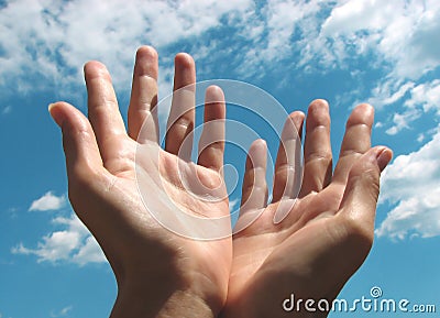 praying-hands-by-the-sky-thumb2872616.jpg