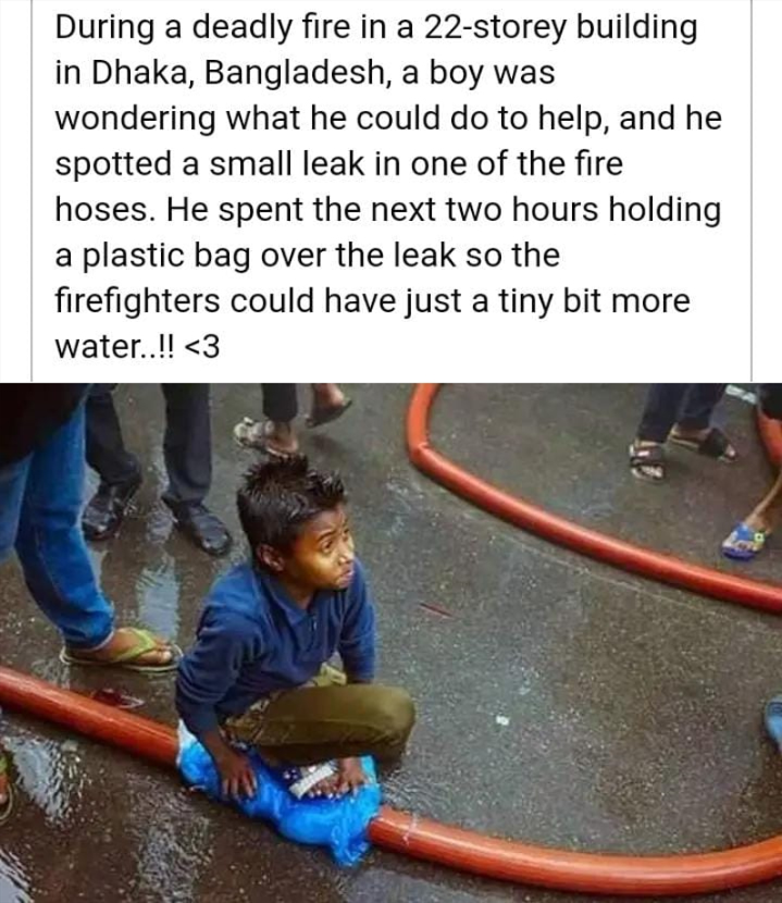 dhaka-child-with-fire-fighters.jpg