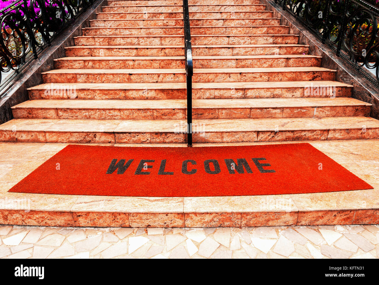 welcome-plastic-red-carpet-in-front-of-the-marble-staircase-at-the-KFTN31.jpg