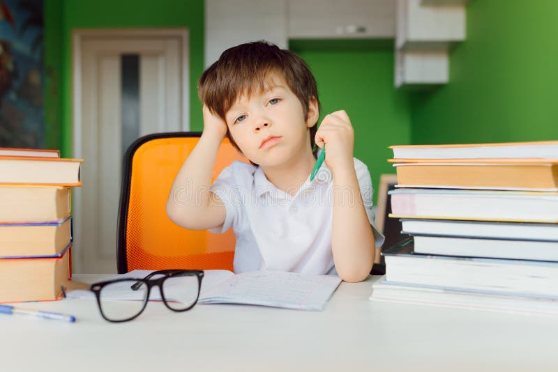 thinking-child-bored-frustrated-fed-up-doing-his-homework-178973113.jpg
