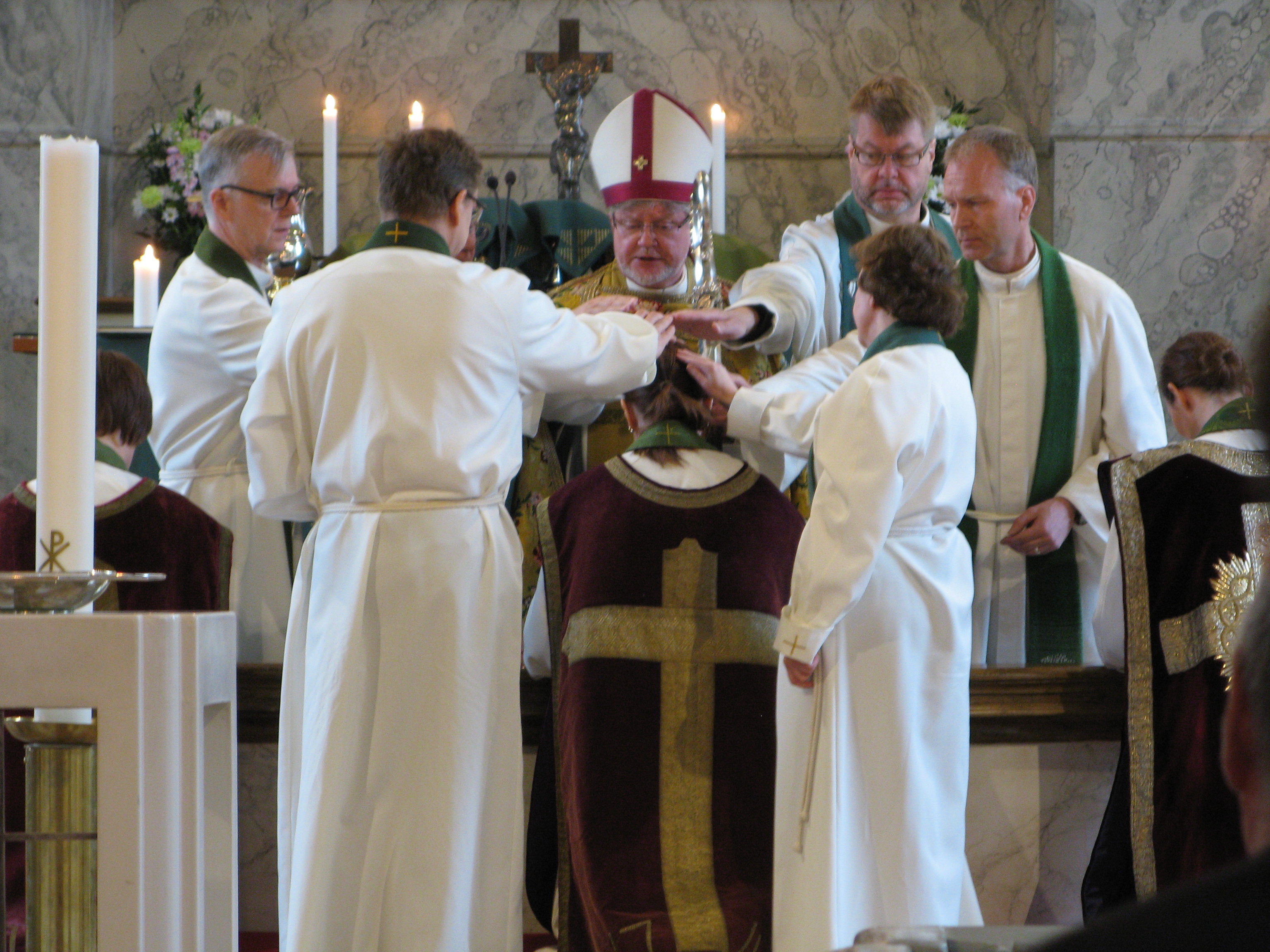 Laying_on_of_hands_Finnish_Lutheran_ordination_in_Oulu.JPG